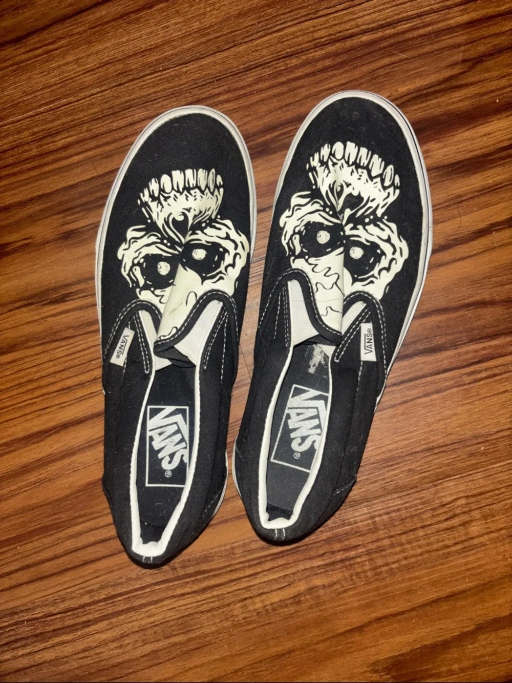 Vans Black & White Slip-On Skull Graphic Sneakers - Picture 1 of 3